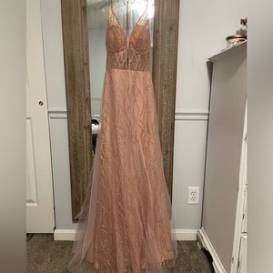 Worn once for prom last year, no damage.